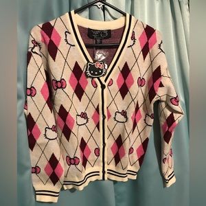 Cream Hello kitty button cardigan. Size kids 13/14.